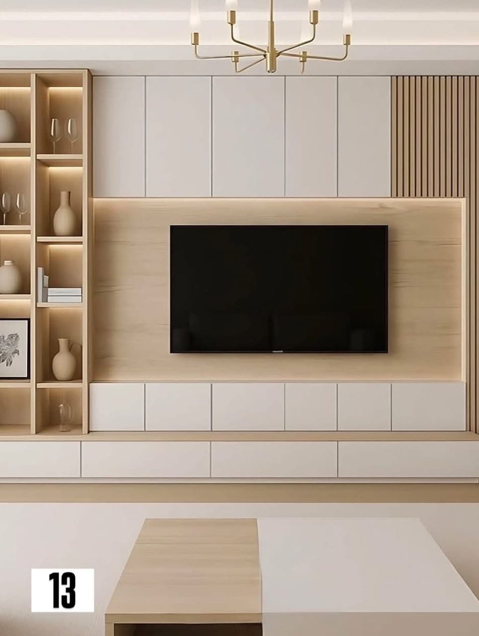 Built-in TV unit with white cabinets, wood shelving and LED accents